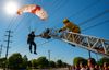 Skydiver Rescued After Dangerous Entanglement in Power Lines